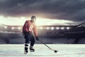 Hockey player on ice . Mixed media Royalty Free Stock Photo