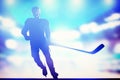 Hockey player skating on ice in arena night lights Royalty Free Stock Photo