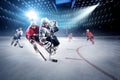 Hockey players shoots the puck and attacks Royalty Free Stock Photo