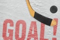 Hockey puck and stick on the ice, the goal Royalty Free Stock Photo