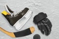 Hockey skates, stick, gloves and puck Royalty Free Stock Photo