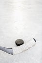 Hockey stick and puck. Royalty Free Stock Photo