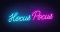 Hocus Pocus neon lettering on brick wall background