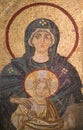 Enthroned Virgin with child - ancient Byzantine apse mosaic in the Hagia Sophia Church in Istanbul, Turkey