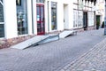 Two handicapped ramps in front of stores made of metal in Hoexter, Germany