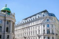 Hofburg imperial palace of Habsburg dynasty near building in Vienna, Austria.