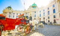 Hofburg palace and horse carriage, Vienna, Austria