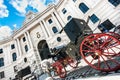 Hofburg Palace with traditional Fiaker carriage in Vienna, Austria