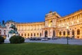 Hofburg Palace in Vienna, Austria. Statue of Emperor Joseph II Evening view with illuminated building.