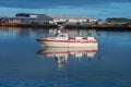 Icelandic fishing boat waiting to get to pier