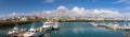 Panoramic view of Several fishing boats and ships in the harbor, The main economic activities in