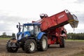 HOGE HEXEL, NETHERLANDS - Aug 30, 2020: Potato grubbing machine with tractor