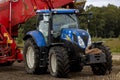 HOGE HEXEL, NETHERLANDS - Aug 30, 2020: Potato grubbing machine with tractor