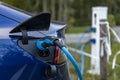 HOGE HEXEL, NETHERLANDS - Aug 30, 2020: Tesla electric car on charging station