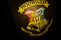 Hogwarts magic school logo on black background