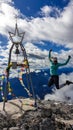 Hohe Warte - A woman jumping from happiness on the Alpine peak