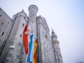 HOHENSCHWANGAU, GERMANY - 23 FEBUARY 2018: Neuschwanstein Castle in winter Close-up. Germany and EU flag.The destination famous ca