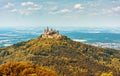 Hohenzollern Castle on mountain top in autumn, Germany Royalty Free Stock Photo