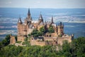 Hohenzollern Castle on mountain top. Germany. Famous landmark in vicinity of Stuttgart. Scenic view of Burg Hohenzollern