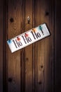 Hohoho Sign With Lights On Rustic Door