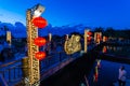 Hoi An city lights and a pedestrian bridge over the Thu Bon river in Vietnam