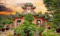 Beautiful vietnamese temple garden with mystic sunset sky