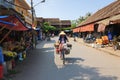 Hoi An, Vietnam - 13 April 2013: Local old women are on bicycle at Hoi An Market