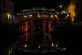 The old Japanese covered bridge colourfully illuminated at night in the heritage town of Hoi An Royalty Free Stock Photo