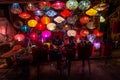A shop selling colorful traditional lanterns at night in the market in the tourist town of Hoi An Royalty Free Stock Photo
