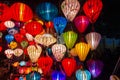 A shop selling colorful traditional lanterns at night in the market in the tourist town of Hoi An Royalty Free Stock Photo