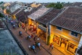 HOI AN, VIETNAM - CIRCA AUGUST 2015: People walking on the streets of old town Hoi An, Vietnam Royalty Free Stock Photo