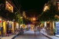 HOI AN, VIETNAM - CIRCA AUGUST 2015: People walking on the streets of old town Hoi An, Vietnam by night Royalty Free Stock Photo