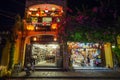 HOI AN, VIETNAM - CIRCA AUGUST 2015: People walking on the streets of old town Hoi An, Vietnam by night Royalty Free Stock Photo