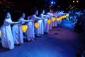 Dancers with illuminated lanterns in a moment of the show represented in the streets of the city during the Integration - Lighten Royalty Free Stock Photo