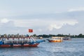 Hoi An, Vietnam - June 2019: colorful tourist boat sailing on Thu Bon river