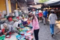 A woman shops the fish at the street wet market in Hoi An, Vietnam. Royalty Free Stock Photo