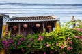 Hoi An, Vietnam - September 02, 2013: The couple is sitting on the balcony of the house