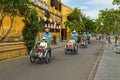 Hoian, Vietnam - JUNE 25, 2019 : Taxi tricycle park in Hoi an old town service tourists by bike around old town