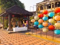 HOIAN, VIETNAM, SEPTEMBER, 04 2017: Unidentified people in the street with some green and red lanterns hanging outside Royalty Free Stock Photo