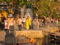 HOIAN, VIETNAM, SEPTEMBER, 04 2017: Unidentified people walking near of boats in front of ancient architecture in Hoi An