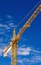 Hoisting crane against a background sky