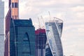 Hoisting cranes and building activity. Construction site of skyscraper Royalty Free Stock Photo