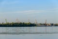 Hoisting cranes at cargo port on the Dnieper river in Kremenchug, Ukraine