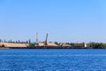 Hoisting cranes at cargo port on the Dnieper river in Kremenchug, Ukraine