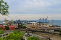 Hoisting cranes, transport containers and granaries at cargo sea port in Odessa, Ukraine