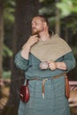 Hojbjerg, Denmark, July 29, 2023: Man in ancient clothes at Viking festival