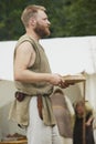 Hojbjerg, Denmark, July 29, 2023: Man cooking at Viking festival