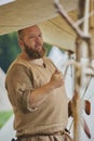 Hojbjerg, Denmark, July 29,2023: Man in old clothes at Viking festival