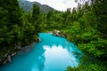 Hokitika Gorge, West Coast, New Zealand. Beautiful nature with blueturquoise color water and wooden swing bridge Royalty Free Stock Photo