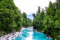 Hokitika Gorge, West Coast, New Zealand. Beautiful nature with blueturquoise color water and wooden swing bridge